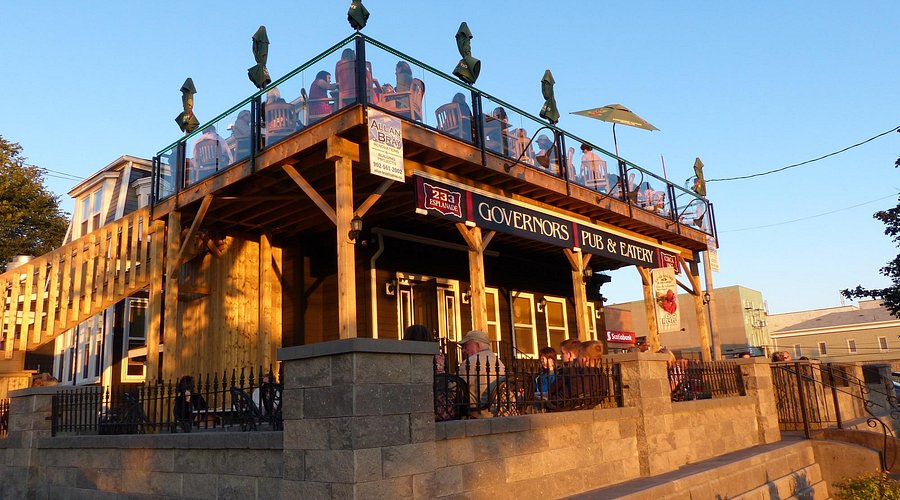 selective focus photography of burger patty, mayonnaise, and French fries served on platter